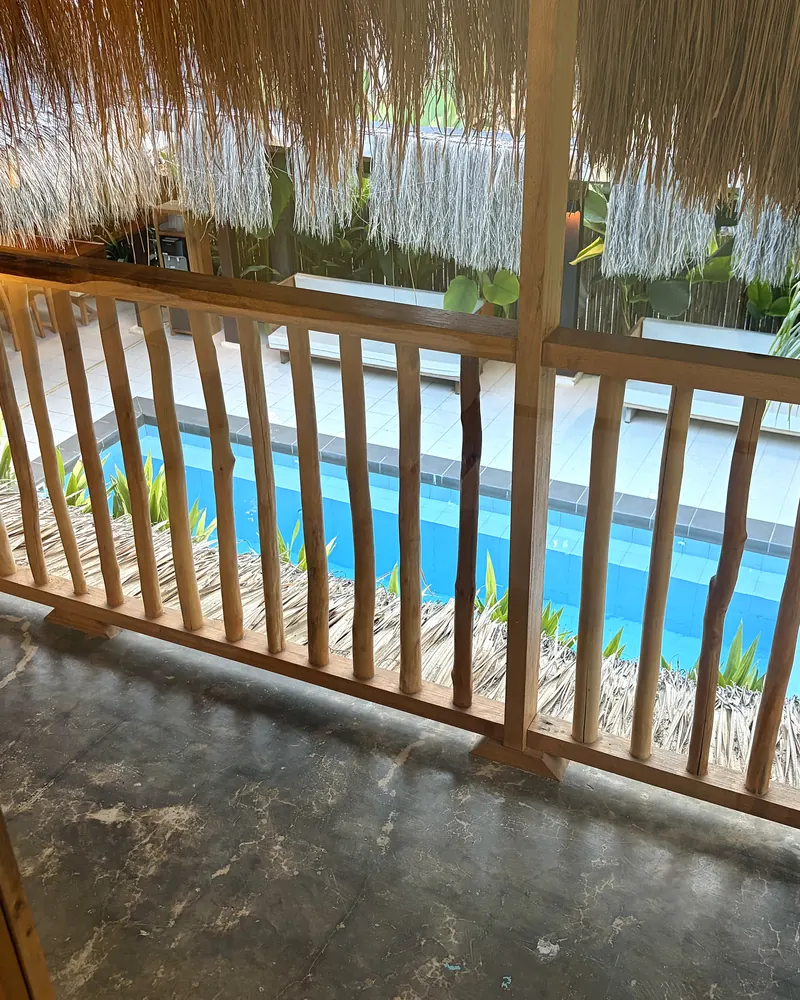 View from an upstairs balcony down to the pool